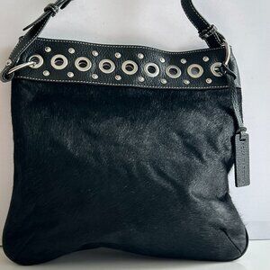 Aqua Madonna Crossbody Bag in Black, accented with Grommets and Studs